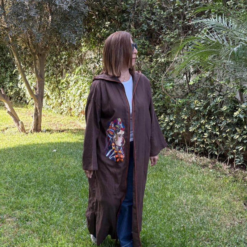 Hand-painted linen abaya for a chic artistic touch.