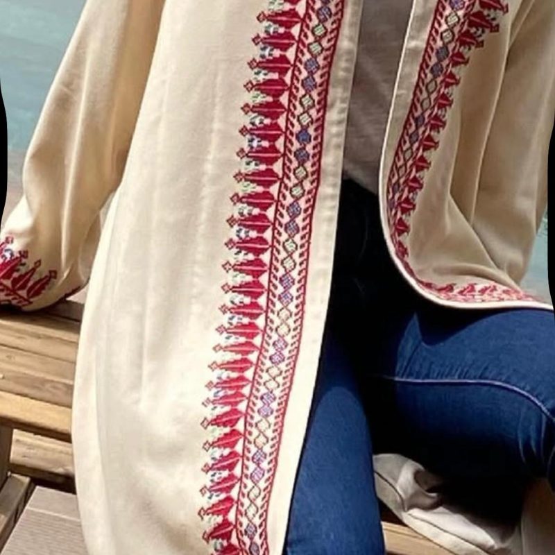 Long jacket adorned with handcrafted Palestinian embroidery