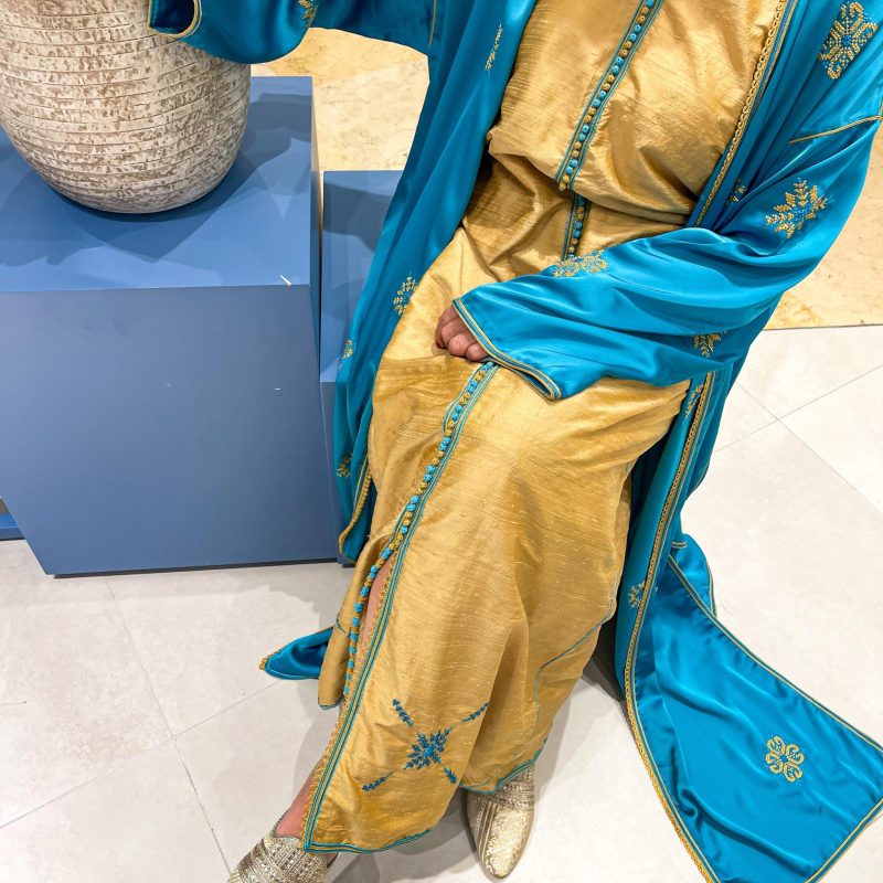 Modern Moroccan caftan with Palestinian embroidery touch