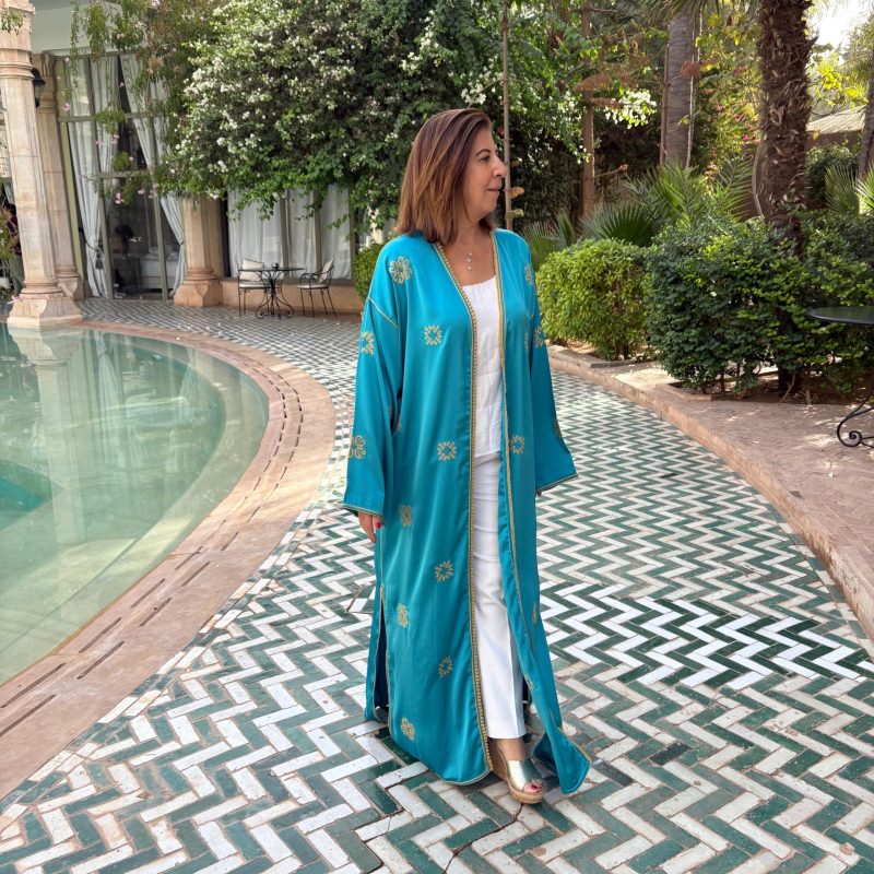 Silk abaya with a delicate touch of Palestinian embroidery