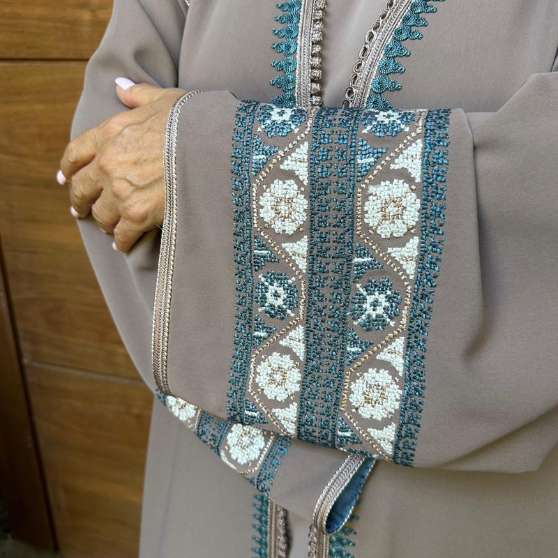 Moroccan caftan adorned with Palestinian embroidery